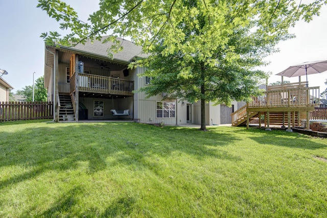 5052 E Cherry Pl, Springfield, MO 65809 - rear view of property featuring stairs, a ceiling fan, a deck, and roof with shingles