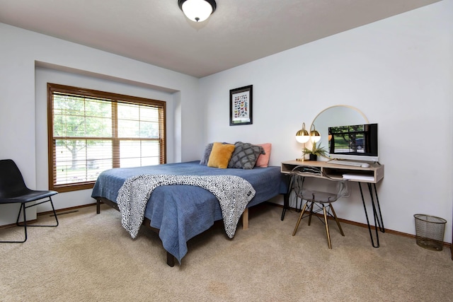 5052 E Cherry Pl, Springfield, MO 65809 - bedroom with light carpet and baseboards