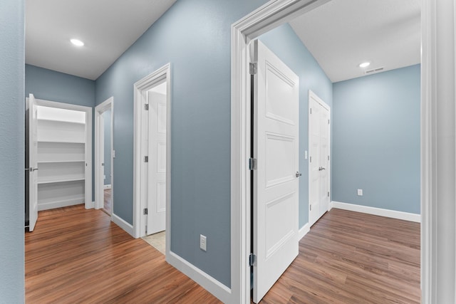 680 Highpoints Rdg, Branson, MO 65616 - hall featuring wood finished floors, baseboards, and recessed lighting