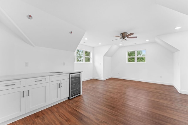 680 Highpoints Rdg, Branson, MO 65616 - bonus room with beverage cooler, dark wood-type flooring, lofted ceiling, recessed lighting, and healthy amount of natural light