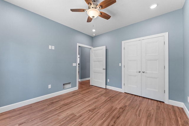 680 Highpoints Rdg, Branson, MO 65616 - unfurnished bedroom featuring wood finished floors, baseboards, a closet, a ceiling fan, and recessed lighting
