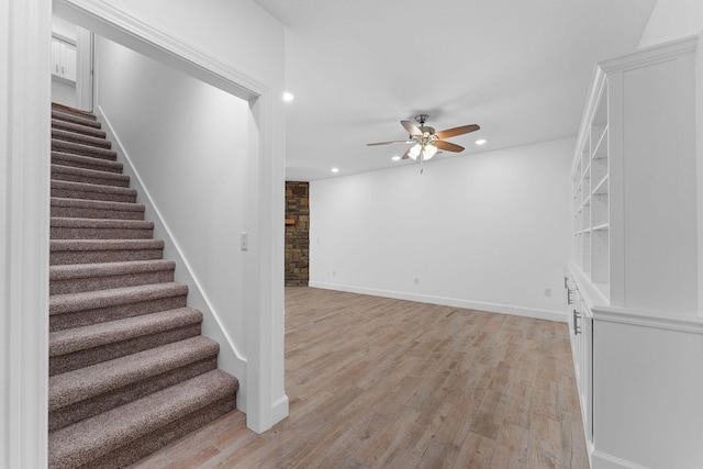 680 Highpoints Rdg, Branson, MO 65616 - staircase featuring a ceiling fan, wood finished floors, and recessed lighting