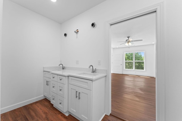680 Highpoints Rdg, Branson, MO 65616 - bathroom with wood finished floors, ceiling fan, double vanity, and baseboards