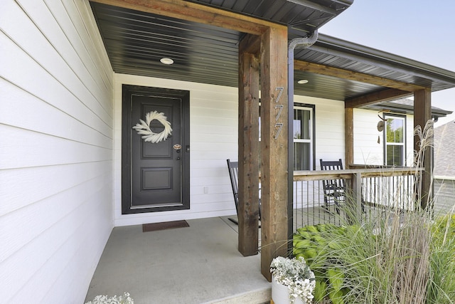 777 S Elm St, Marshfield, MO 65706 - doorway to property with a porch