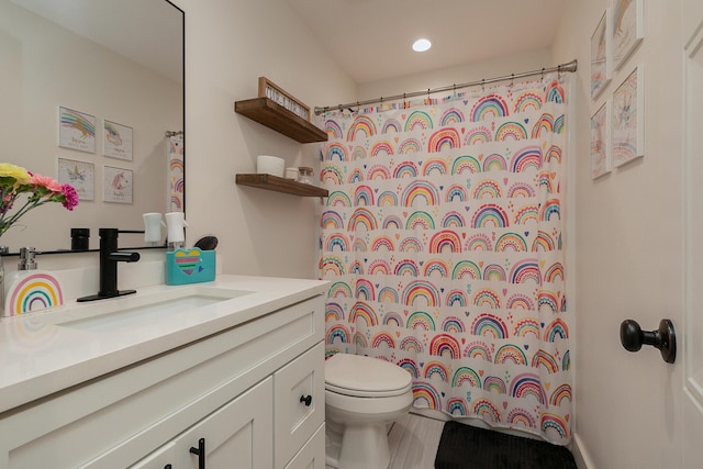 777 S Elm St, Marshfield, MO 65706 - bathroom featuring vanity, a shower with curtain, and recessed lighting