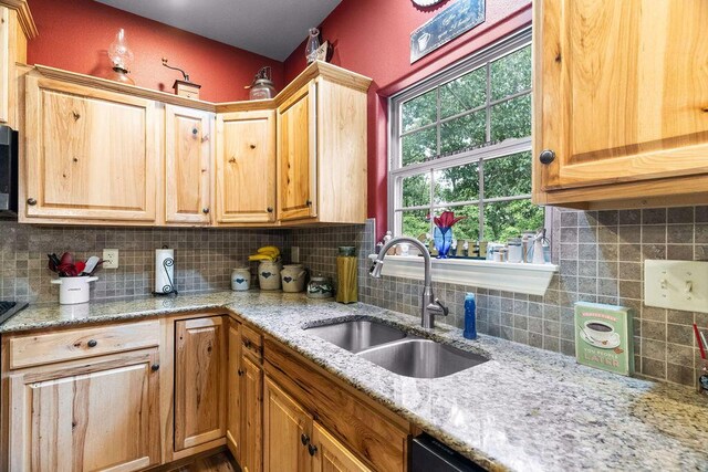 6 Glory Ln, Blue Eye, MO 65611 - kitchen featuring a sink, tasteful backsplash, and light stone countertops