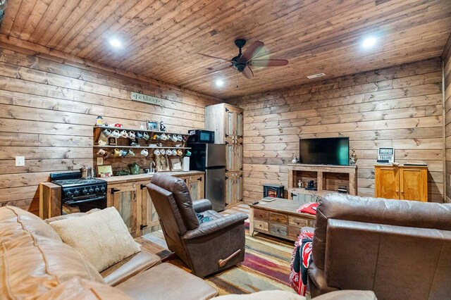 6 Glory Ln, Blue Eye, MO 65611 - living area featuring wooden ceiling, a ceiling fan, wooden walls, and recessed lighting