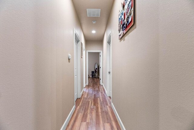 6 Glory Ln, Blue Eye, MO 65611 - corridor featuring light wood finished floors, baseboards, and recessed lighting