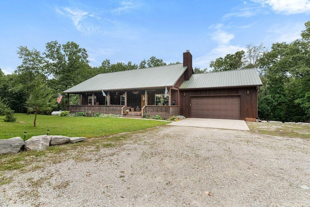 6 Glory Ln, Blue Eye, MO 65611 - view of front facade featuring covered porch, gravel driveway, a garage, a front yard, and a chimney