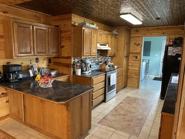23700 E State Highway 76, Rocky Comfort, MO 64861 - kitchen with electric range, under cabinet range hood, electric panel, wooden walls, and a peninsula