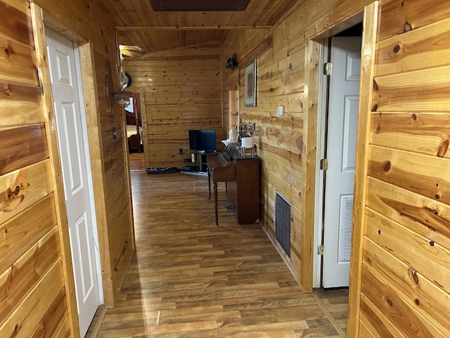 23700 E State Highway 76, Rocky Comfort, MO 64861 - hall with wooden walls, wood finished floors, and wood ceiling