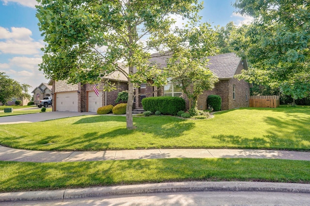 3210 Aussie Ct, Springfield, MO 65810 - view of property hidden behind natural elements featuring concrete driveway, brick siding, a garage, and a shingled roof