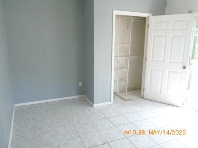 1098 Sundown Ln, Forsyth, MO 65653 - unfurnished bedroom with a closet and baseboards