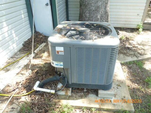 1098 Sundown Ln, Forsyth, MO 65653 - exterior view of central air condition unit