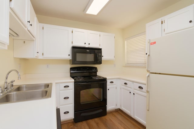 118 Vixen Cir Unit D, Branson, MO 65616 - kitchen featuring black appliances, a sink, and white cabinets