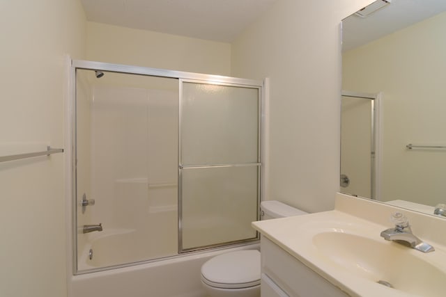 118 Vixen Cir Unit D, Branson, MO 65616 - bathroom featuring toilet, vanity, and shower / bath combination with glass door