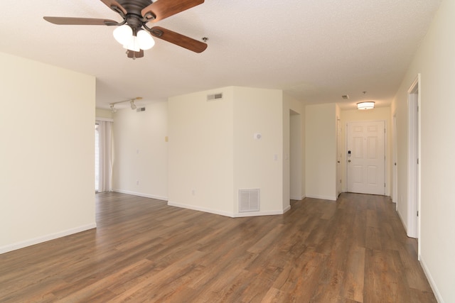 118 Vixen Cir Unit D, Branson, MO 65616 - unfurnished room featuring dark wood-style flooring, ceiling fan, and baseboards