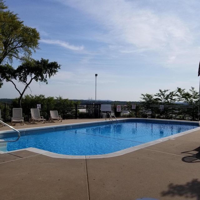 118 Vixen Cir Unit D, Branson, MO 65616 - community pool with a patio area