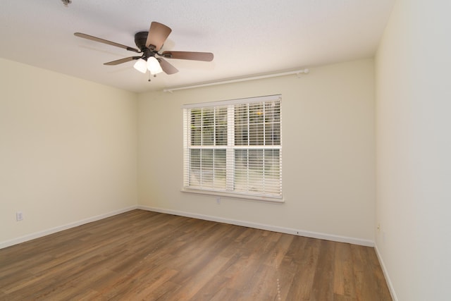 118 Vixen Cir Unit D, Branson, MO 65616 - spare room with wood finished floors, baseboards, and a ceiling fan