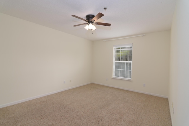 118 Vixen Cir Unit D, Branson, MO 65616 - spare room featuring light carpet, ceiling fan, and baseboards