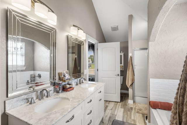 22 Kinder Ln, Rogersville, MO 65742 - full bath featuring double vanity, healthy amount of natural light, a stall shower, lofted ceiling, and a bath