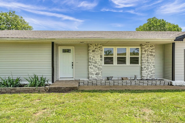 32 State Road F, Buffalo, MO 65622 - doorway to property with a lawn, stone siding, and roof with shingles