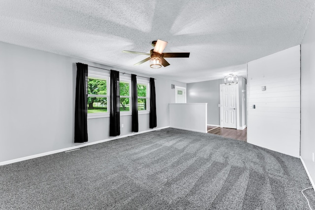 32 State Road F, Buffalo, MO 65622 - spare room featuring dark colored carpet, a textured ceiling, ceiling fan, and baseboards