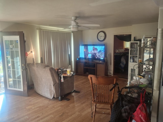 1224 Columbus St, West Plains, MO 65775 - living area with wood finished floors and a ceiling fan