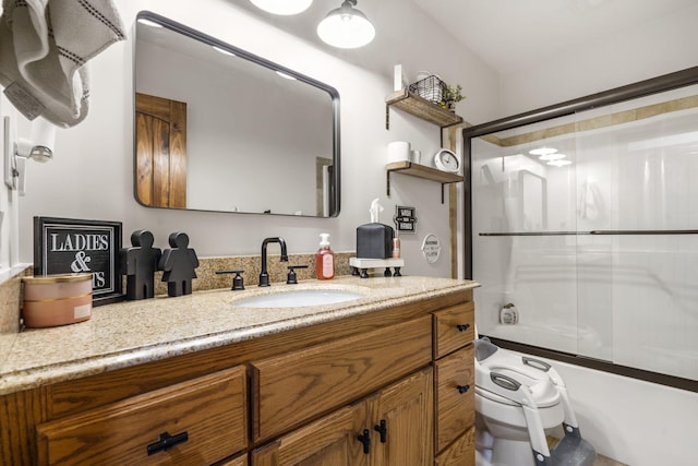 1427 W Missouri St, Buffalo, MO 65622 - full bath featuring vanity, enclosed tub / shower combo, and toilet