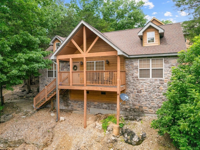 41 Stepping Stone Way Unit 55, Branson West, MO 65737 - rustic home with stone siding, stairway, and a shingled roof