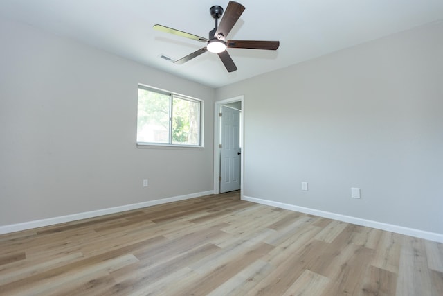 3218 W Countryside Dr, Springfield, MO 65807 - unfurnished room featuring baseboards, light wood-style floors, and ceiling fan