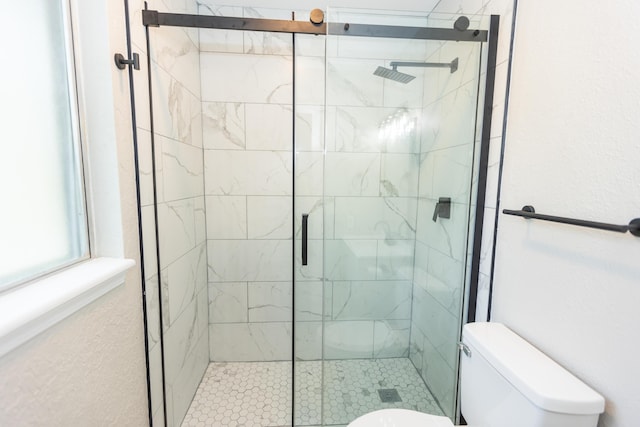3218 W Countryside Dr, Springfield, MO 65807 - bathroom featuring toilet and a shower stall