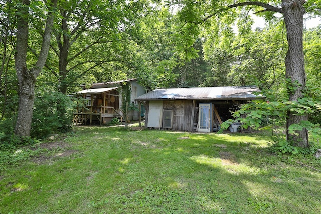 12234 Co Rd Unit 76-269, Ava, MO 65608 - view of green lawn featuring a view of trees