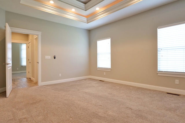 1189 N Cedar Ridge Ave, Springfield, MO 65802 - empty room with ornamental molding, light carpet, a raised ceiling, recessed lighting, and baseboards