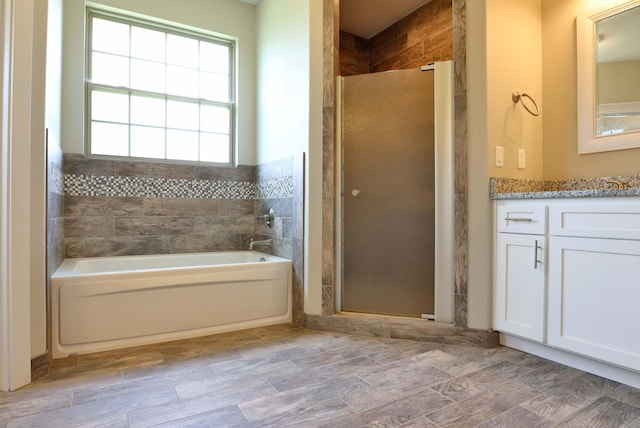 1189 N Cedar Ridge Ave, Springfield, MO 65802 - full bath featuring a bath, vanity, and a shower stall