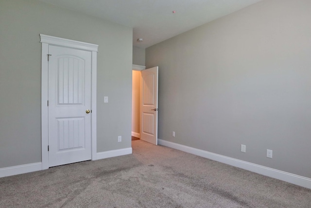 1189 N Cedar Ridge Ave, Springfield, MO 65802 - unfurnished bedroom featuring carpet floors and baseboards