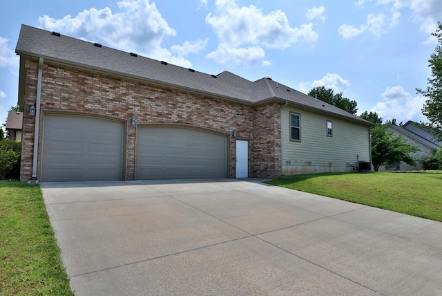 1189 N Cedar Ridge Ave, Springfield, MO 65802 - view of side of home featuring concrete driveway, a lawn, brick siding, an attached garage, and a shingled roof