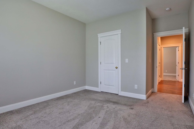 1189 N Cedar Ridge Ave, Springfield, MO 65802 - unfurnished bedroom featuring carpet floors and baseboards