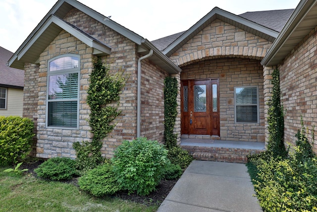 1189 N Cedar Ridge Ave, Springfield, MO 65802 - entrance to property with brick siding, stone siding, and roof with shingles