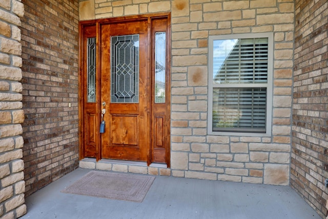 1189 N Cedar Ridge Ave, Springfield, MO 65802 - view of exterior entry featuring brick siding