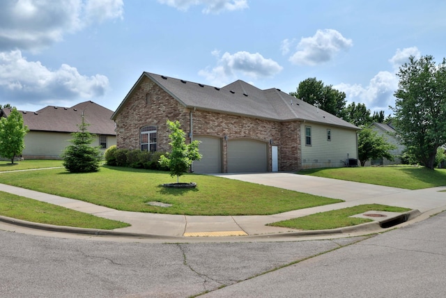 1189 N Cedar Ridge Ave, Springfield, MO 65802 - view of property exterior with a yard, brick siding, concrete driveway, and a garage
