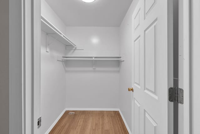 875-883 State Route T, West Plains, MO 65775 - spacious closet featuring wood finished floors