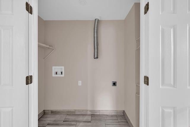 875-883 State Route T, West Plains, MO 65775 - washroom with washer hookup, hookup for an electric dryer, and baseboards