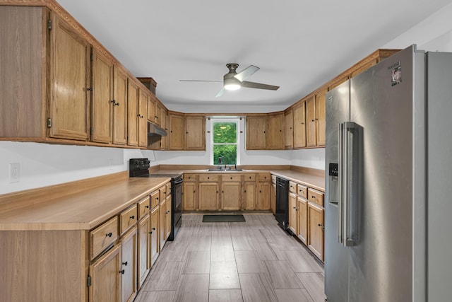 875-883 State Route T, West Plains, MO 65775 - kitchen with black appliances, under cabinet range hood, ceiling fan, a sink, and light countertops