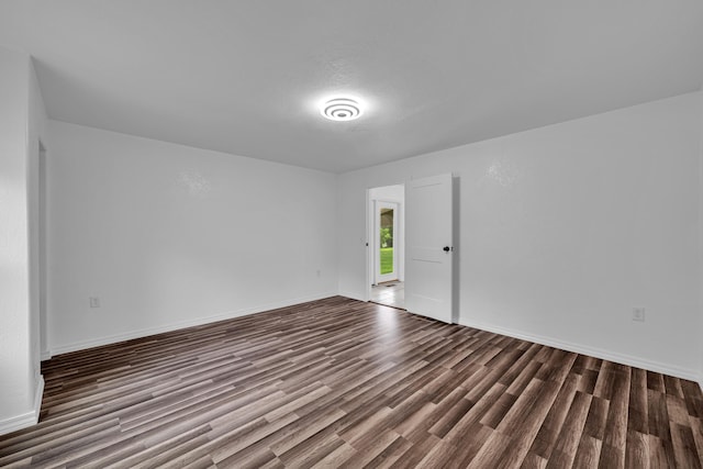 875-883 State Route T, West Plains, MO 65775 - spare room with dark wood finished floors and baseboards
