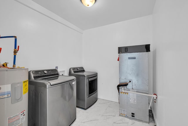 875-883 State Route T, West Plains, MO 65775 - laundry room with electric water heater, light marble finish flooring, washing machine and dryer, and heating unit