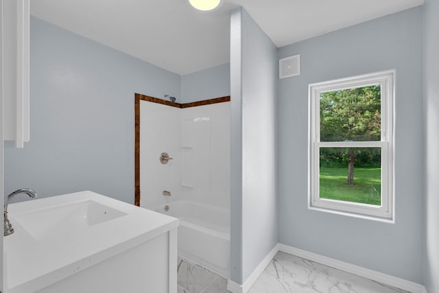 875-883 State Route T, West Plains, MO 65775 - full bathroom featuring shower / tub combination, marble finish flooring, baseboards, and vanity
