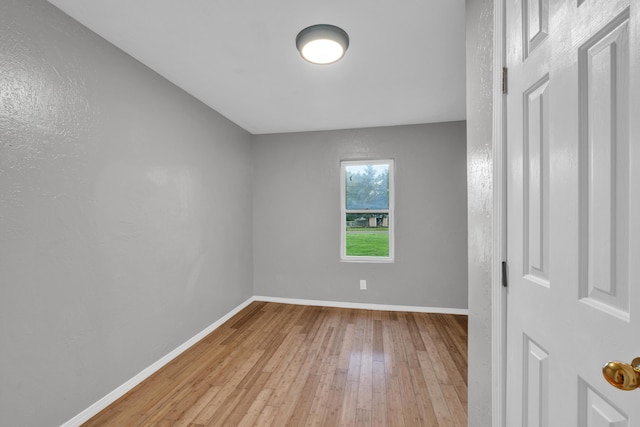 875-883 State Route T, West Plains, MO 65775 - spare room with wood-type flooring and baseboards