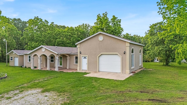 875-883 State Route T, West Plains, MO 65775 - single story home with stucco siding, a front yard, and driveway
