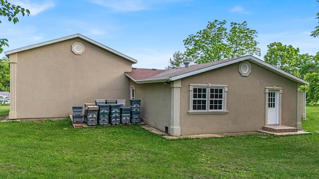875-883 State Route T, West Plains, MO 65775 - rear view of house with a yard and stucco siding